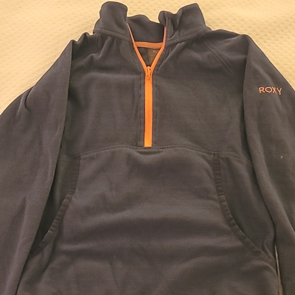 A size 10 Roxy 1/2 zip pullover. That is super soft.